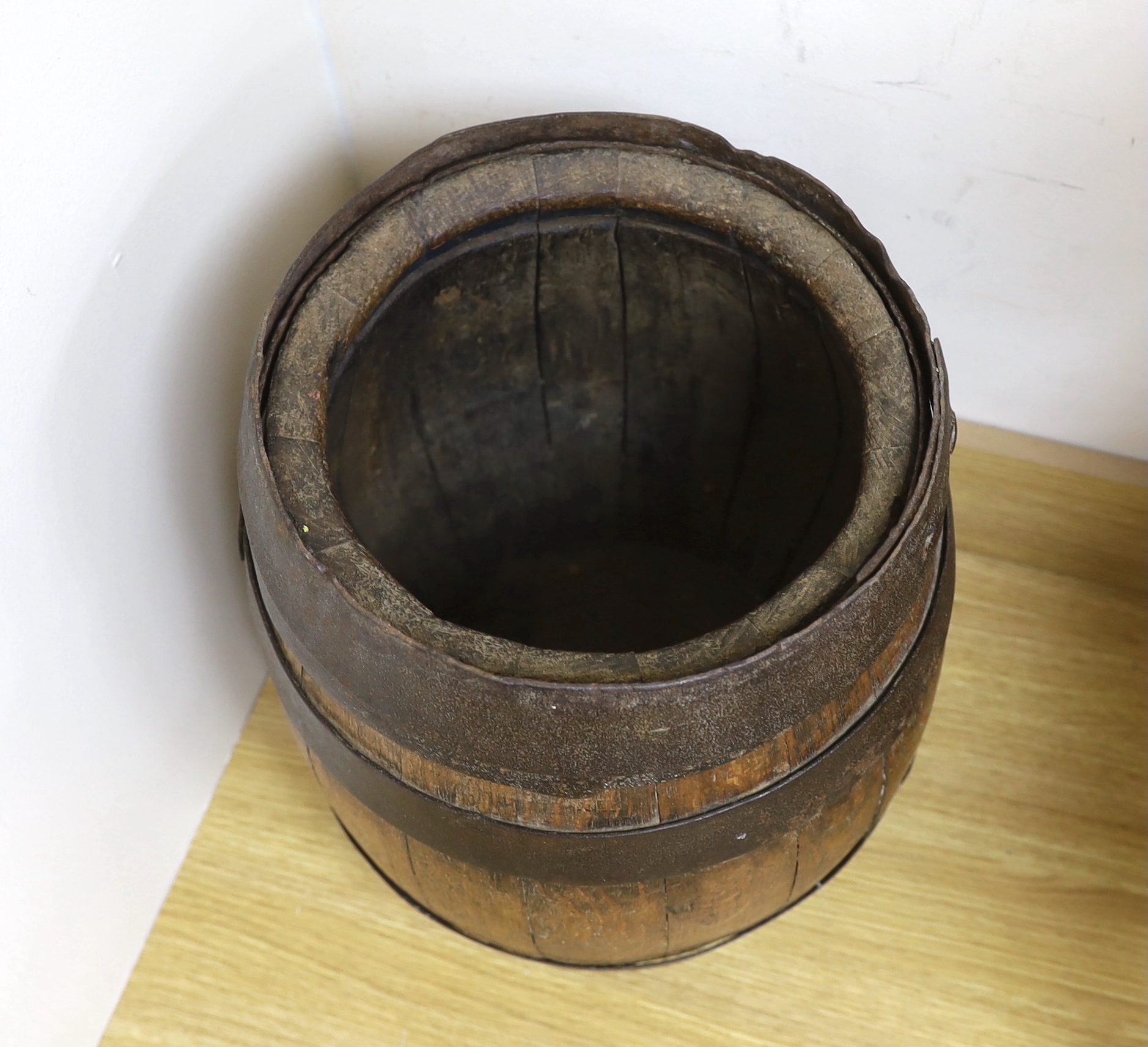 A wrought iron bound coopered oak barrel, 44cm